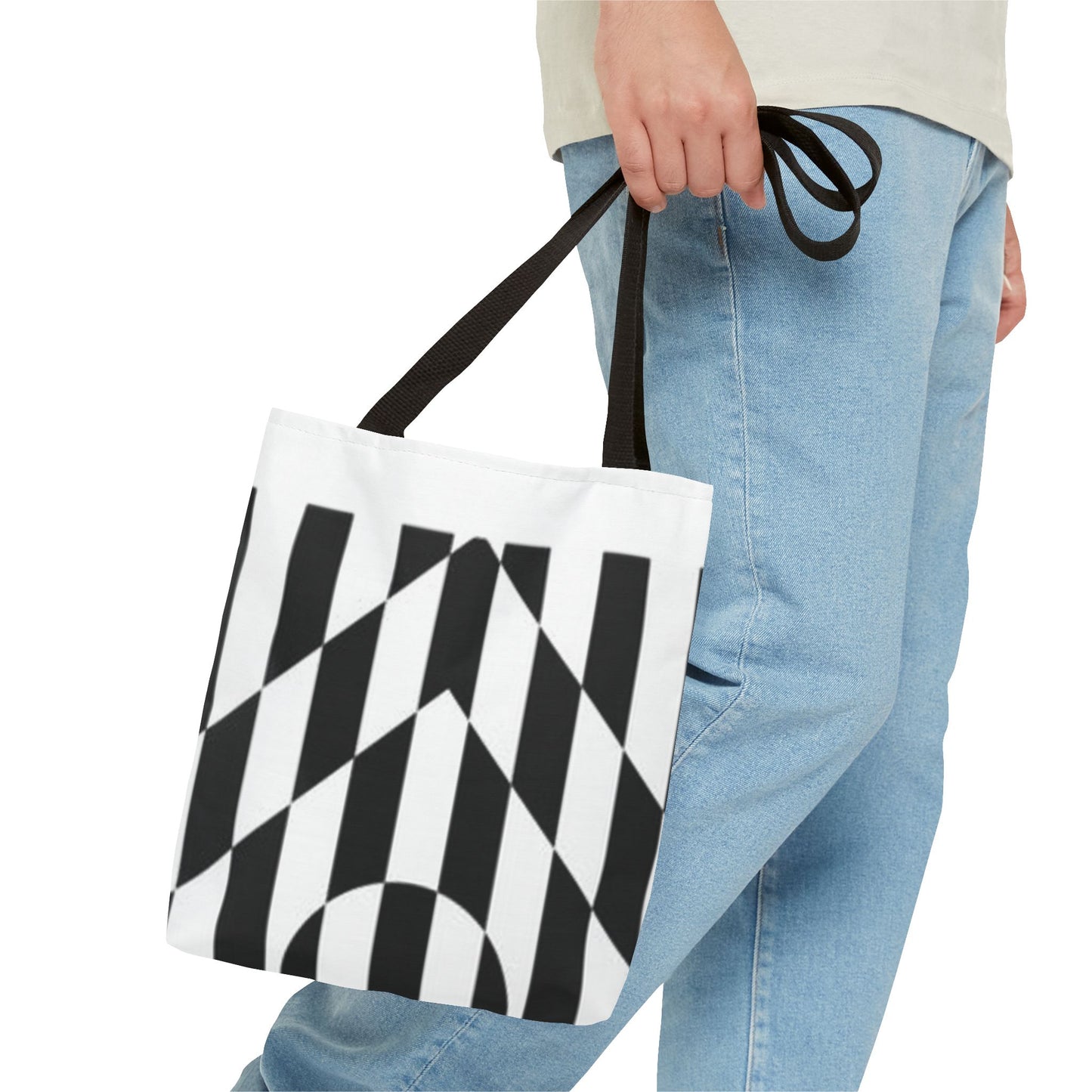 Model carrying a fashionable and sustainable black handled tote bag, perfect for daily use