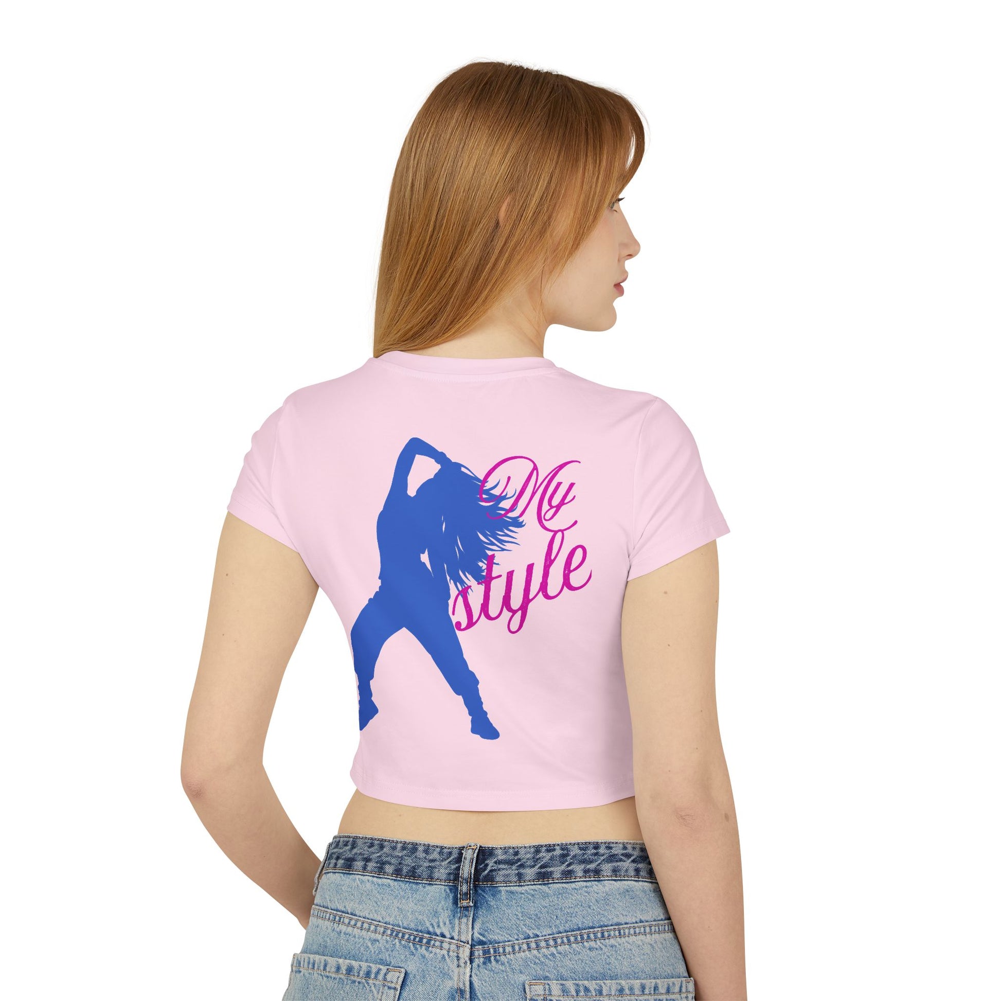 Casual yet stylish outfit featuring 
 the back side of women's graphic baby tee worn by a model outdoor