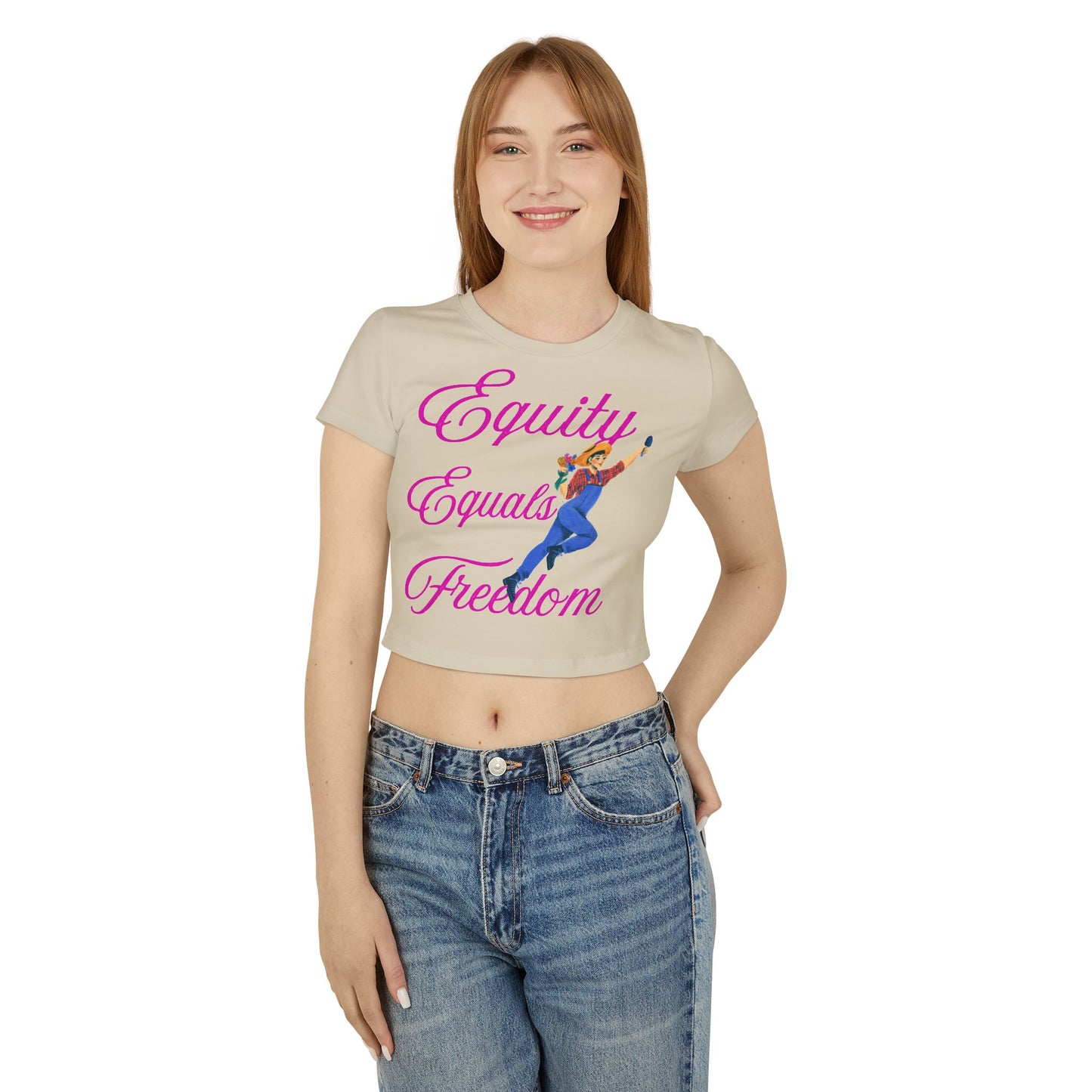 "Casual yet stylish outfit featuring a women's graphic baby tee worn by a model outdoors